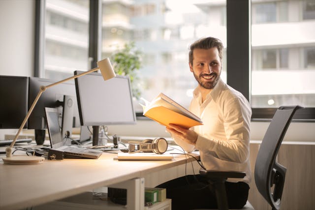 IV ketamine Man smiling happily in the office