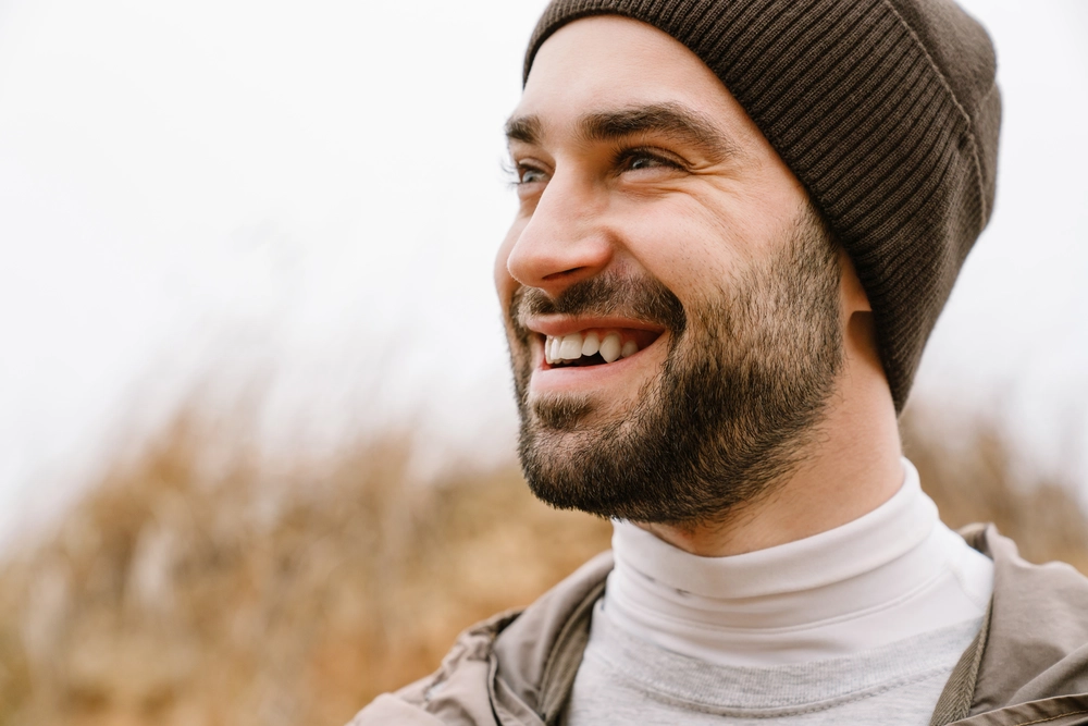 young-happy-sportsman-laughing-while-working-out